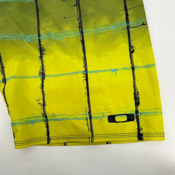 Oakley Men's 34 Cargo Board Shorts Swim Bathing Suit Surf Pocket Black Yellow - Picture 2 of 7